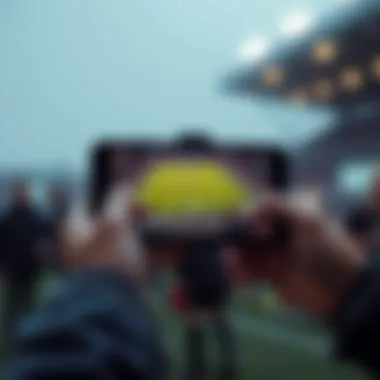 Streaming Champions League on Mobile Devices A handheld device streaming a Champions League game on the go.